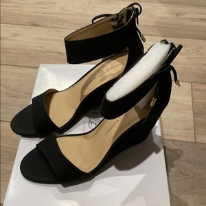 Brand new: Black wedges